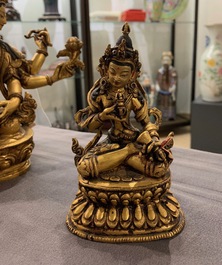 Five Sino-Tibetan gilt bronze Buddha figures, 19/20th C.
