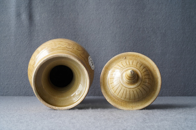 A Chinese brown-glazed vase and cover with incised design, Song