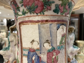 Two Chinese famille rose 'court scene' vases, 19th C.