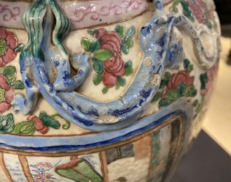 Two Chinese famille rose 'court scene' vases, 19th C.