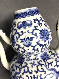 A Chinese blue and white 'bats and shou' jug, 19th C.