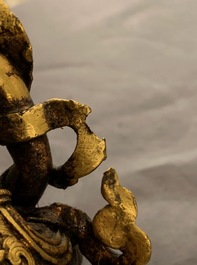 Five Sino-Tibetan gilt bronze Buddha figures, 19/20th C.