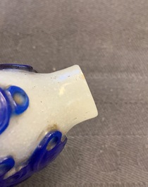 Nine various Chinese blue overlay and transparent glass snuff bottles, 19/20th C.