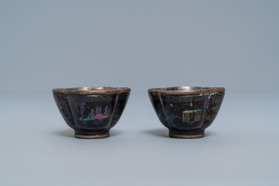Three Chinese lac burgaut&eacute; saucers and two cups, Kangxi