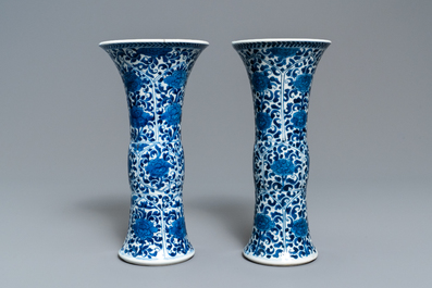 A Chinese blue and white five-piece garniture with floral design, Kangxi