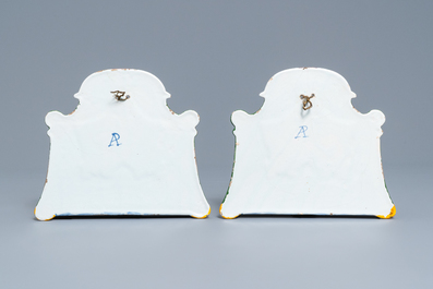 A pair of polychrome Dutch Delft trompe l'oeil birdcage plaques, 19th C.