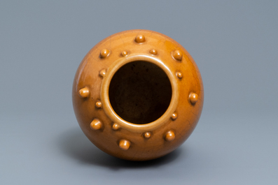 A Chinese monochrome brown-glazed jar, 19th C.