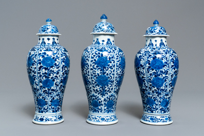 A Chinese blue and white five-piece garniture with floral design, Kangxi