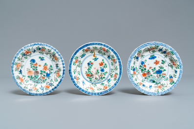 Six lobed Chinese famille verte caf&eacute;-au-lait-ground cups and saucers, Kangxi