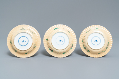 Six lobed Chinese famille verte caf&eacute;-au-lait-ground cups and saucers, Kangxi