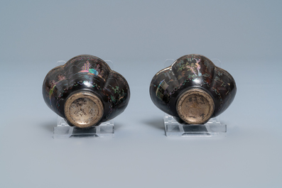 Three Chinese lac burgaut&eacute; saucers and two cups, Kangxi