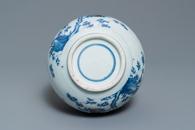 A Chinese blue, white and copper-red 'peaches' bottle vase with inscription, Kangxi