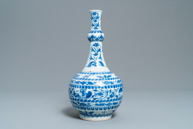 A Chinese blue and white bottle vase with figural medallions, Transitional period