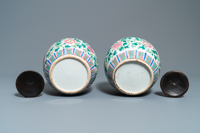 A pair of Chinese famille rose ginger jars with phoenixes, 19th C.