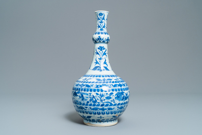 A Chinese blue and white bottle vase with figural medallions, Transitional period