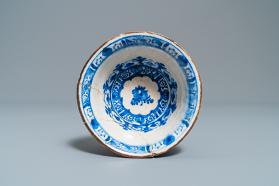 A Persian blue and white vase, a bowl and a dish, Syria and/or Iran, 18/19th C.