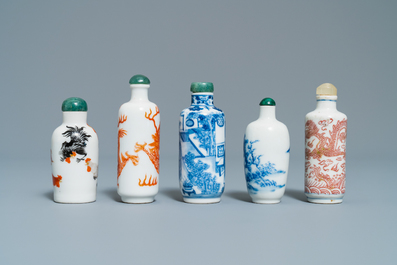 Five Chinese blue and white, iron- and copper-red snuff bottles, 19th C.