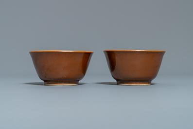 Eight Chinese blue and white cups and saucers, Kangxi/Qianlong