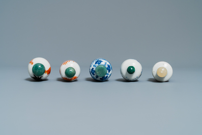 Five Chinese blue and white, iron- and copper-red snuff bottles, 19th C.