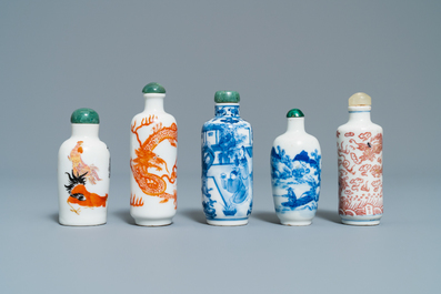 Five Chinese blue and white, iron- and copper-red snuff bottles, 19th C.