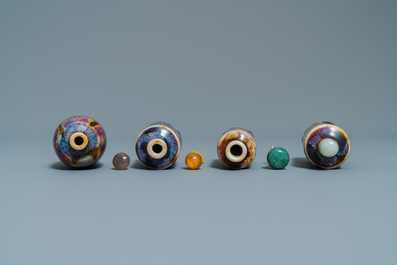 Nine Chinese monochrome and flamb&eacute;-glazed snuff bottles, 19/20th C.