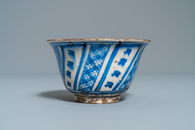 A Persian blue and white vase, a bowl and a dish, Syria and/or Iran, 18/19th C.