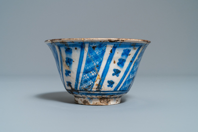 A Persian blue and white vase, a bowl and a dish, Syria and/or Iran, 18/19th C.