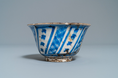 A Persian blue and white vase, a bowl and a dish, Syria and/or Iran, 18/19th C.