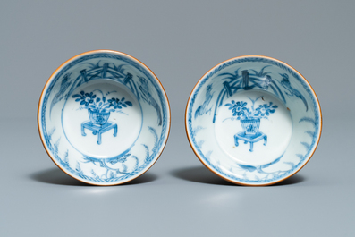 Eight Chinese blue and white cups and saucers, Kangxi/Qianlong