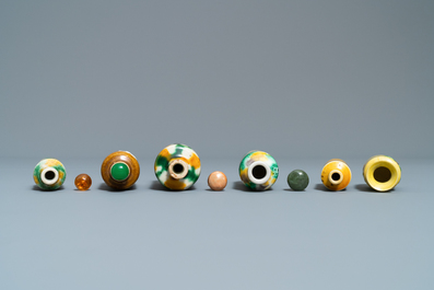 Twelve Chinese monochrome and sancai-glazed snuff bottles, 19/20th C.