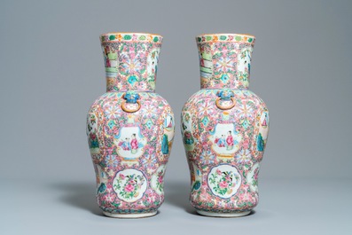 A pair of Chinese Canton famille rose pink-ground vases, 19th C.