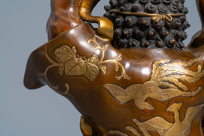 A large Japanese parcel-gilt bronze okimono of Benkei holding a koro or incense burner, attr. to Miyao Eisuke, Meiji, ca. 1900