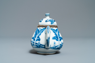 Three Chinese silver-mounted blue and white vases and a teapot, Kangxi