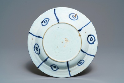Two Dutch Delft blue and white chinoiserie plates and a dish, 17/18th C.
