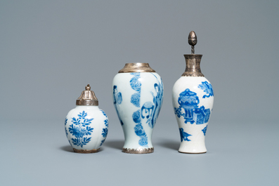 Three Chinese silver-mounted blue and white vases and a teapot, Kangxi