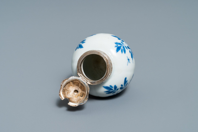 Three Chinese silver-mounted blue and white vases and a teapot, Kangxi