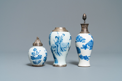 Three Chinese silver-mounted blue and white vases and a teapot, Kangxi