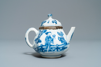 Three Chinese silver-mounted blue and white vases and a teapot, Kangxi