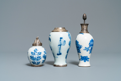 Three Chinese silver-mounted blue and white vases and a teapot, Kangxi