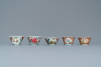 Five Chinese famille rose cups and saucers, Yongzheng/Qianlong