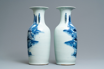 A pair of Chinese blue and white 'landscape' vases, 19th C.