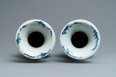 A pair of Chinese blue and white 'landscape' vases, 19th C.