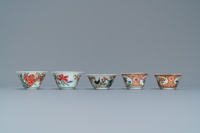 Five Chinese famille rose cups and saucers, Yongzheng/Qianlong
