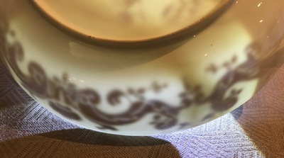 A pair of Chinese Pronk studio eggshell plates with parrots, Yongzheng/Qianlong