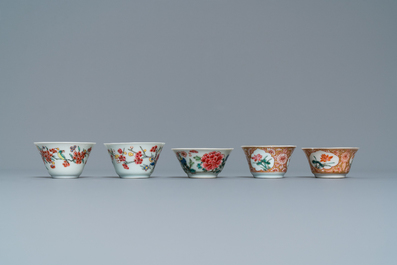 Five Chinese famille rose cups and saucers, Yongzheng/Qianlong