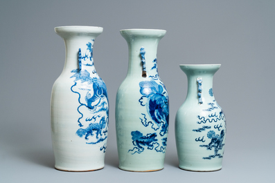 Three Chinese blue and white and celadon-ground 'Buddhist lion' vases, 19th C.