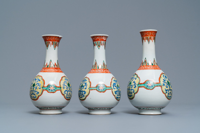 Three Chinese famille verte bottle vases, Kangxi