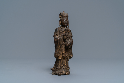 A Chinese bronze figure of a dignitary, Ming