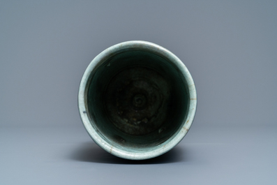 A blue and white cylindrical Islamic pottery vase, Syria or Iran, 19th C.