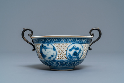 A Chinese silver-mounted blue and white reticulated bowl, Transitional period